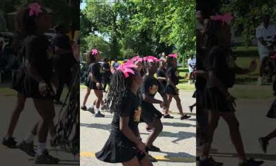 Wichita Juneteenth Parade 2026: Performers march down parade route keeping in step.