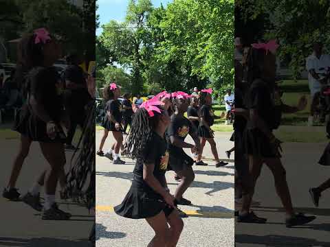 Wichita Juneteenth Parade 2026: Performers march down parade route keeping in step.