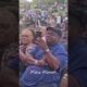 Fans join Rome on stage at a concert, captured by The Community Voice (KS)