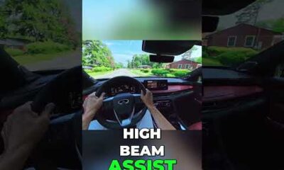 Driver using car's advanced safety features: adaptive cruise control and lane assist for a safer drive