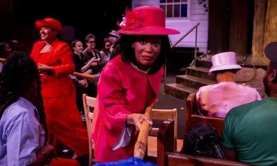 Audience members become part of the congregation in Pray, an immersive production at Baltimore Center Stage where every performance unfolds differently. Credit: Photo courtesy of Pray