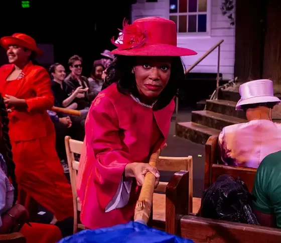 Audience members become part of the congregation in Pray, an immersive production at Baltimore Center Stage where every performance unfolds differently. Credit: Photo courtesy of Pray