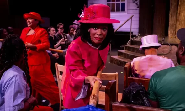 Audience members become part of the congregation in Pray, an immersive production at Baltimore Center Stage where every performance unfolds differently. Credit: Photo courtesy of Pray