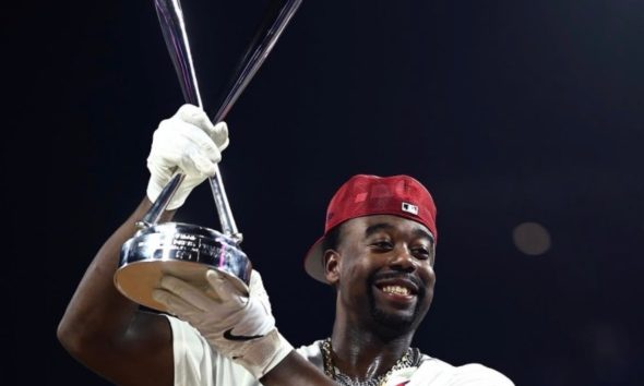Jordan Walker displays the Home Run Derby trophy he won with an epic performance on Monday night at Citizens Bank Park in Philadelphia.