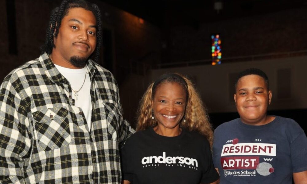 Michelle Bonton, founder and executive director of the Anderson Center for the Arts (Center), stands with the winners of the first Apollo HTX competition, Troy Mason (Left) and Logan Gilbert (Right). Credit: Jimmie Aggison/Defender