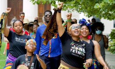 Members of Visual Movement, based in East St. Louis, Illinois, lead a march from the Old Courthouse to the riverfront during the 2nd Annual Juneteenth Commemoration on June 19, 2021. Photo by Wiley Price | St. Louis American