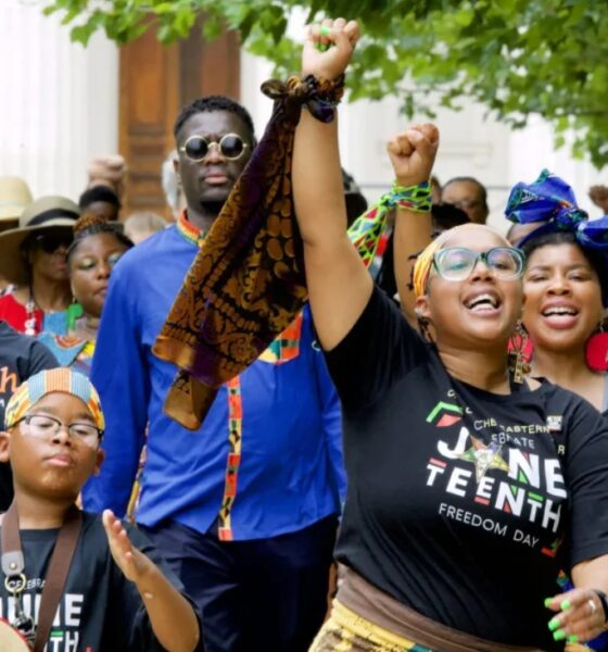 Members of Visual Movement, based in East St. Louis, Illinois, lead a march from the Old Courthouse to the riverfront during the 2nd Annual Juneteenth Commemoration on June 19, 2021. Photo by Wiley Price | St. Louis American