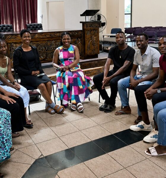 Monifa McKnight (center) meets with some of the African Methodist Episcopal students studying at Africa University. McKnight, a lay member of the African Methodist Episcopal Church, is the first non-United Methodist to sit on the executive board of Africa University (Tennessee) Inc. The meeting held in the Kwang Lim Chapel enabled McKnight to interact with students who are members of her denomination. Photo courtesy of McKnight.