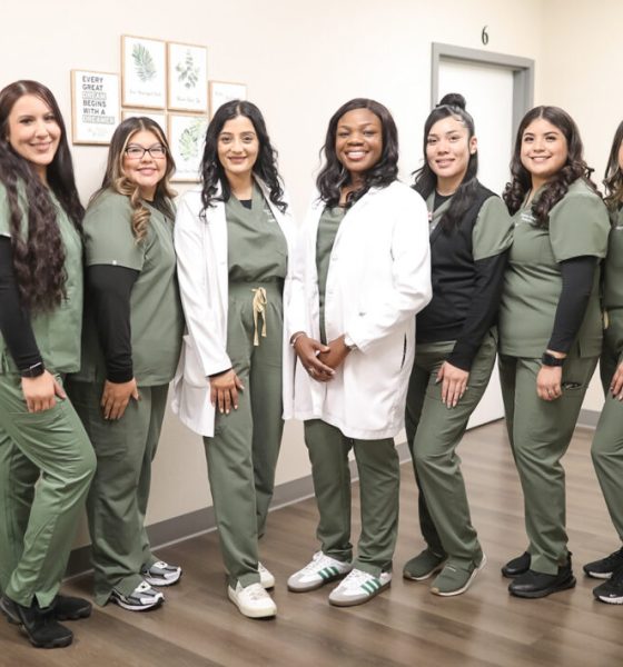 Dr. Ololade Oladimeji and her team pose at Peridot Health Medical clinic in McFarland, which Oladimeji opened just a year ago. "Patients are grateful to have us here."