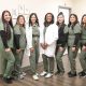 Dr. Ololade Oladimeji and her team pose at Peridot Health Medical clinic in McFarland, which Oladimeji opened just a year ago. "Patients are grateful to have us here."
