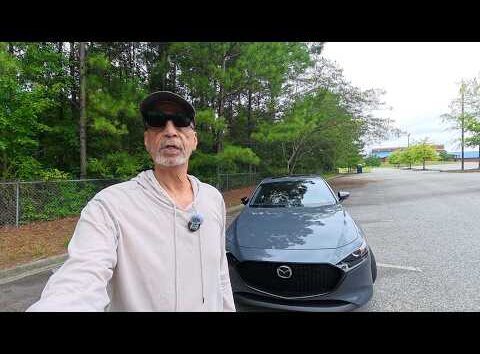 2026 Mazda3 2.5 S Carbon Edition Hatchback in gray, AutoNetwork logo