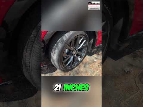 Sleek SUV with 21-inch wheels and panoramic roof, achieving 39 MPG in city driving