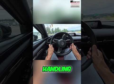 2023 Mazda3 sedan with premium interior highlights, showcasing luxury features for sale.