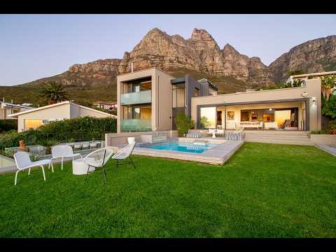 Modern Villa Luna in Camps Bay, South Africa, featuring ocean views and luxury amenities.