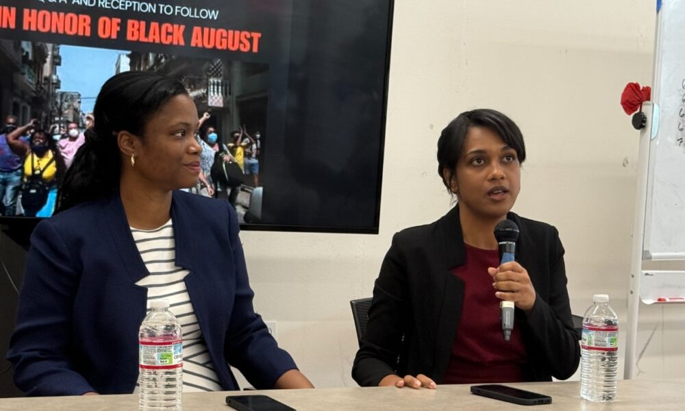 Speakers from the Cuban embassy First Secretary Sulia Páez Chacon (left) and Second Secretary Gabriela Castillo shared the harsh realities caused by the U.S. blockade that has intensified dramatically this year. Photo by Ken Epstein.