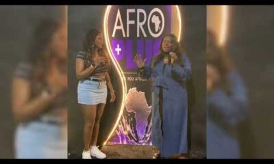 Afro Plus Fest Day 2 Washington Informer street scene with diverse crowd and performers.