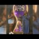 Afro Plus Fest Day 2 Washington Informer street scene with diverse crowd and performers.