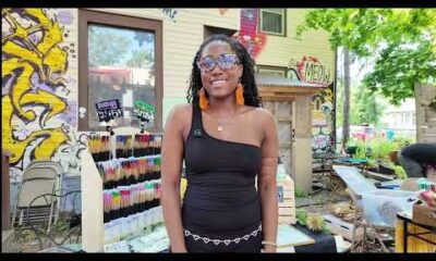 Handcrafted Flame Reaction Candle Co. products and logo, spotlighting a Black-owned business in the Twin Cities.