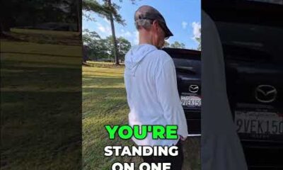 Foot-activated liftgate demonstration in a parking lot to avoid embarrassment.