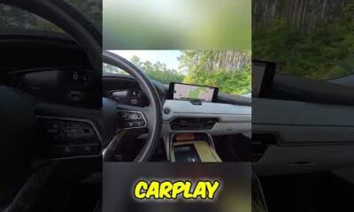 Mazda CX-90 interior tech with large displays, Bose audio, and wireless CarPlay