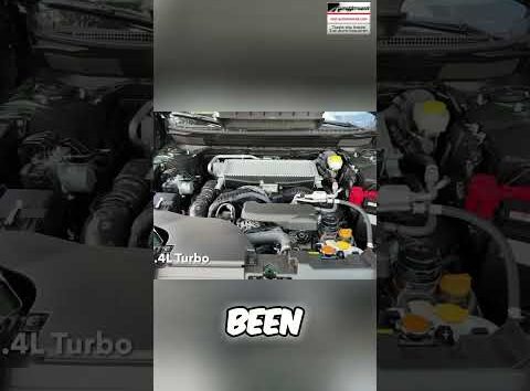 Subaru Outback Turbo engine with hood open, showcasing its power and performance.