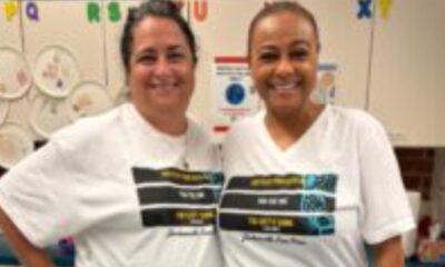 Pictures are Pine Forest School of the Arts teachers Laura Hammock, left, and Tanya Bolden wearing their Jacksonville Free Press "Keep Your Head Up' shirts in support of the Journalism Fund.