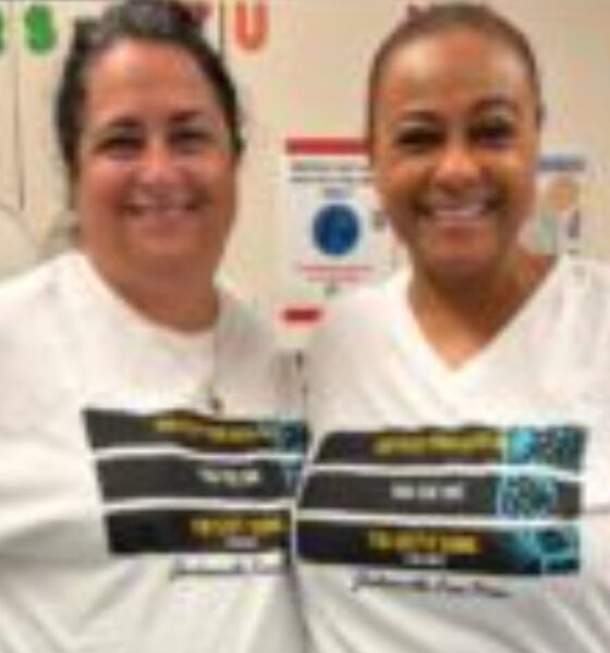 Pictures are Pine Forest School of the Arts teachers Laura Hammock, left, and Tanya Bolden wearing their Jacksonville Free Press "Keep Your Head Up' shirts in support of the Journalism Fund.