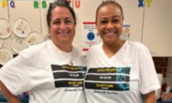 Pictures are Pine Forest School of the Arts teachers Laura Hammock, left, and Tanya Bolden wearing their Jacksonville Free Press "Keep Your Head Up' shirts in support of the Journalism Fund.