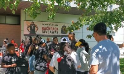 Portland Trail Blazers point guard and Oakland High School alum Damian Lillard hosts back-to-school giveaway at Ira Jinkins Recreation Center in East Oakland. Photo by Carla Thomas.