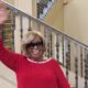 Standing by her birthday cake, Nuna McKee waves to family and friends who came from far and near to celebrate her birthday. Courtesy photo.