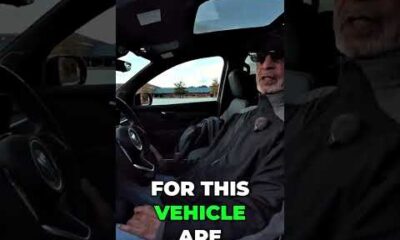 Buick Enclave SUV driving on a highway, shown in an AutoNetwork car review thumbnail.