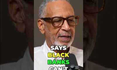 Black man in a suit discussing financial services and Black-owned banks in a YouTube short for AutoNetwork.