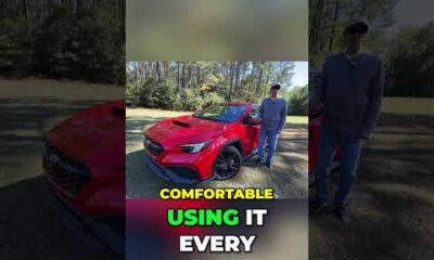 Subaru WRX parked in a driveway with text overlay: Buying a Subaru WRX? Get the full price before you sign.