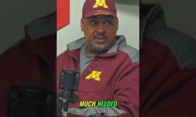 Minnesota Golden Gophers football player in uniform looking focused on the field during a game.