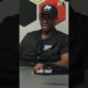 Person speaking directly to camera with text overlay about life lessons learned through adversity in a YouTube Short.