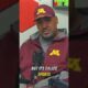 Vince Wright speaking into a microphone with Sports Done Wright podcast branding and a Minnesota background.