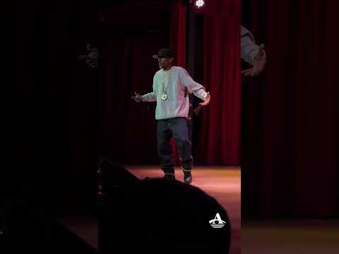 Legendary rapper Rakim performing live on stage at City Winery St. Louis for an energetic concert show.