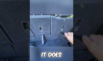 Folded second row seats expand cargo space in this car, shown in an AutoNetwork short.