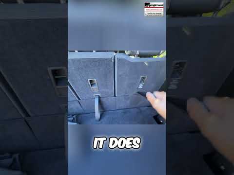 Folded second row seats expand cargo space in this car, shown in an AutoNetwork short.