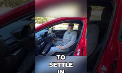 Driver adjusting their car seat position for optimal safety and comfort before driving.