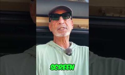 Car buyer asking dealership questions about a new car purchase.