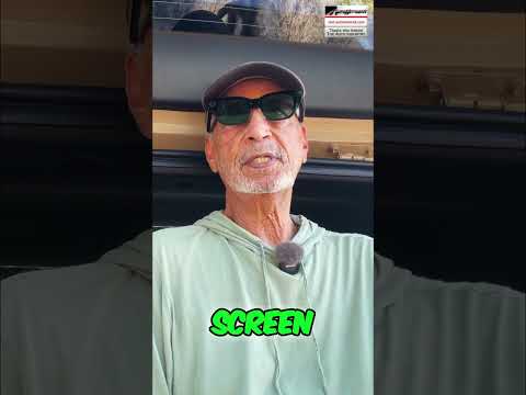 Car buyer asking dealership questions about a new car purchase.