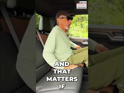 Spacious interior of a modern crew cab pickup truck showing ample room for multiple child safety seats.