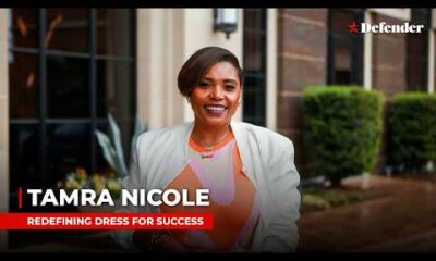 Tamra Nicole modeling a professional dress for success outfit during a Houston Defender Network interview segment.