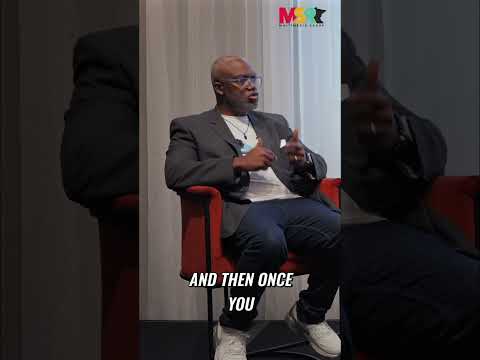Motivational speaker sharing advice on finding your life purpose and attracting success in a YouTube Shorts video.