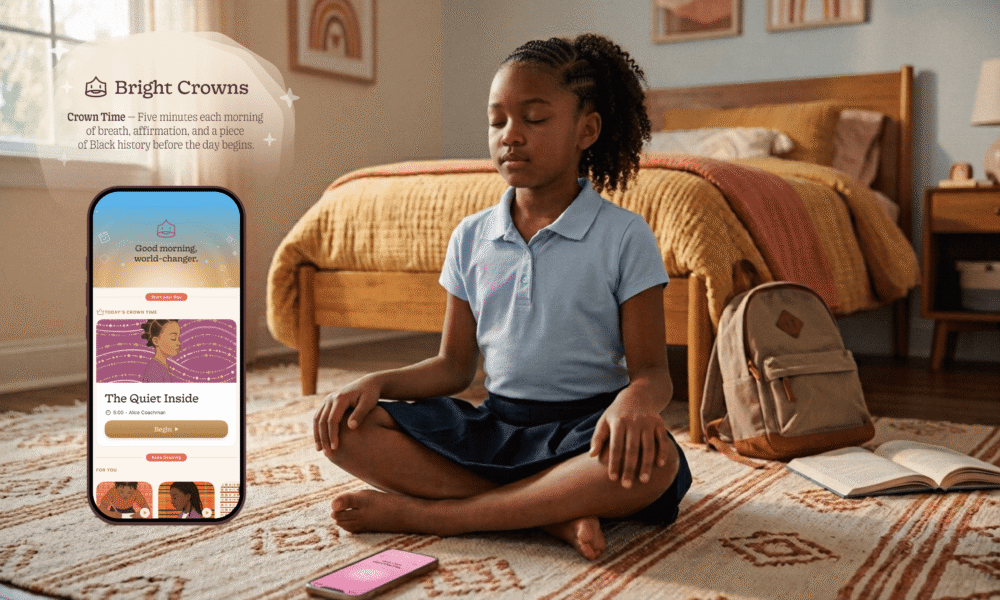 A young Black girl in a school uniform meditates on her bedroom floor beside a phone running the Bright Crowns app.
