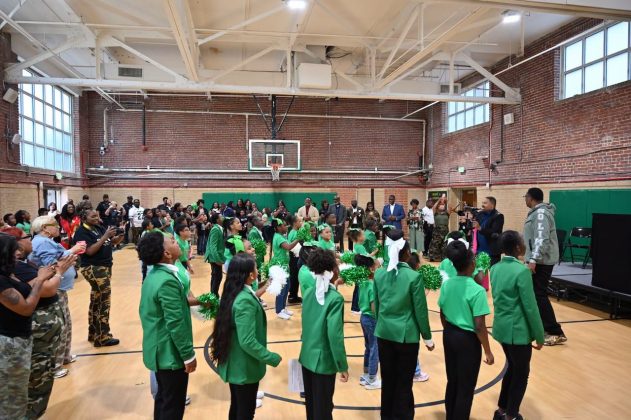 Scholars assembled in the gym to perform a song for Miller, who shared words of wisdom with the student body. (Birmingham City Schools)