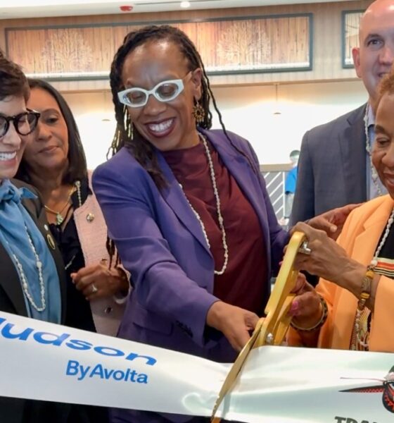 Oakland Mayor Barbara Lee cuts the ribbon at the official opening of Trader Vic’s Outpost and Plum Market at Oakland International Airport. She is assisted by U.S. Rep. Lateefah Simon as Port of Oakland Board President Stephanie Dominguez Walton, left, and representatives from Trader Vic's, Plum Market, look on. Photo courtesy of the mayor’s office.