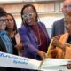 Oakland Mayor Barbara Lee cuts the ribbon at the official opening of Trader Vic’s Outpost and Plum Market at Oakland International Airport. She is assisted by U.S. Rep. Lateefah Simon as Port of Oakland Board President Stephanie Dominguez Walton, left, and representatives from Trader Vic's, Plum Market, look on. Photo courtesy of the mayor’s office.