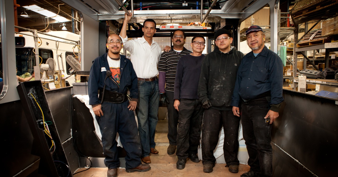 Joel Young with bus union workers. Courtesy photo.
